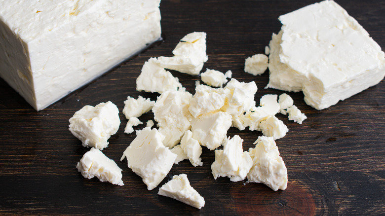 Crumbling a Block of Feta Cheese