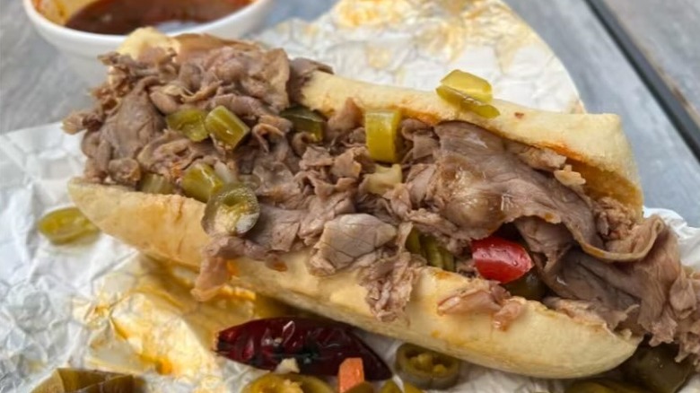 Hot pot Italian beef sandwich with jus on the side at 3 Little Pigs