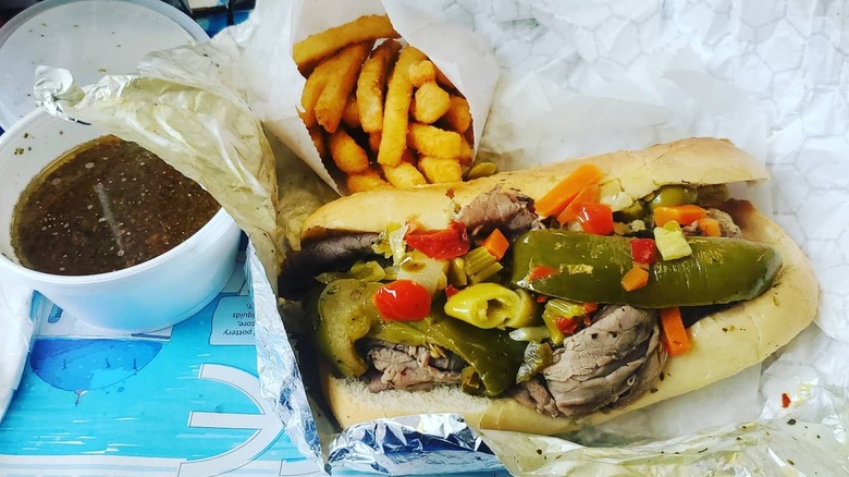 Italian beef sandwich with jus and fries at Pappa Gyros