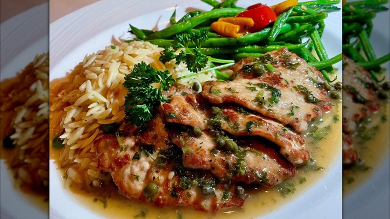vitello picatta, a dish made with veal, rice and vegetables