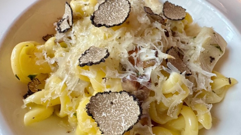 Pasta with shaved truffle on a plate