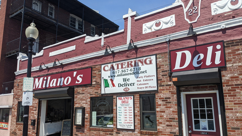 Brick storefront of Milano's Deli in East Boston, Massachusetts.