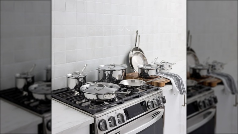 Stainless steel cookware set on stove