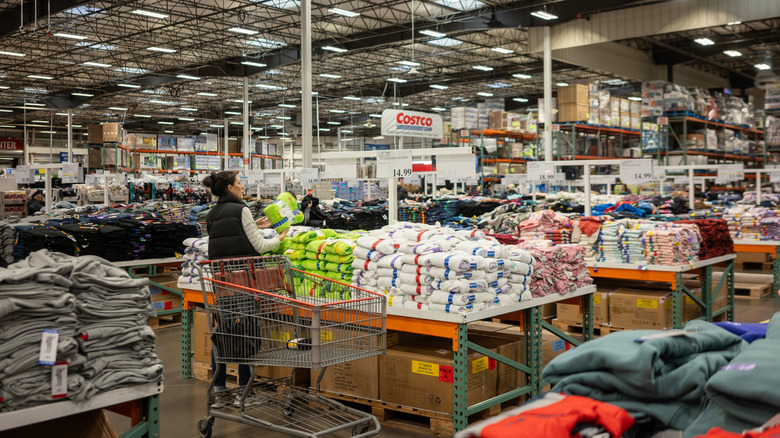 person shopping for towels inside costco