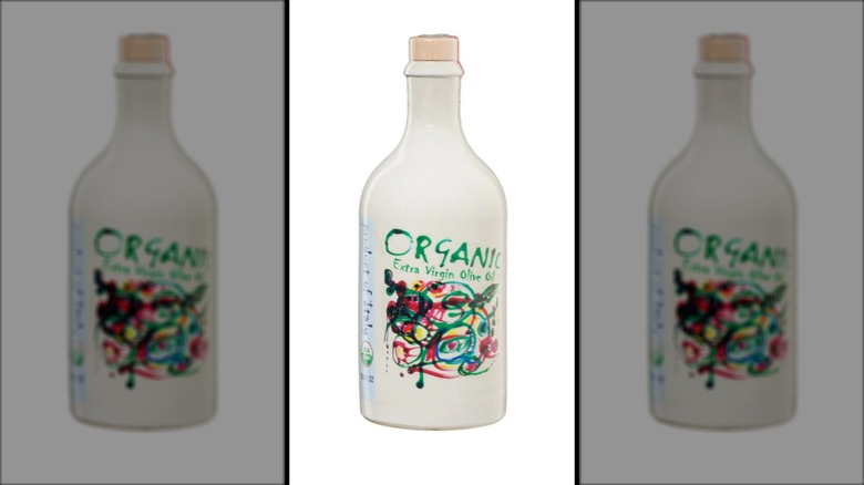 white ceramic bottle containing organic extra virgin olive oil