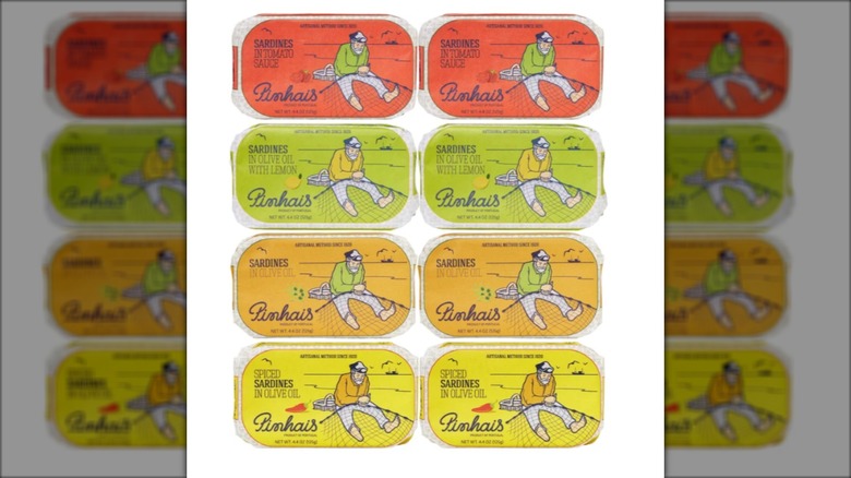 assorted varieties of sardines in colorful cans