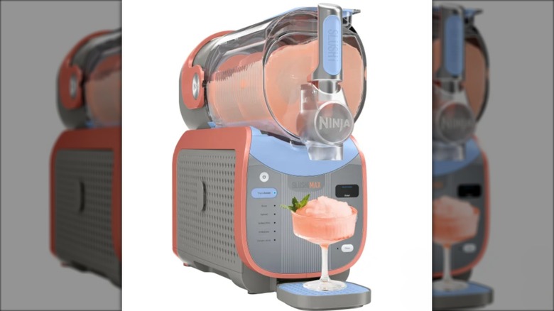 Ninja frozen drink maker dispensing a slushie beverage