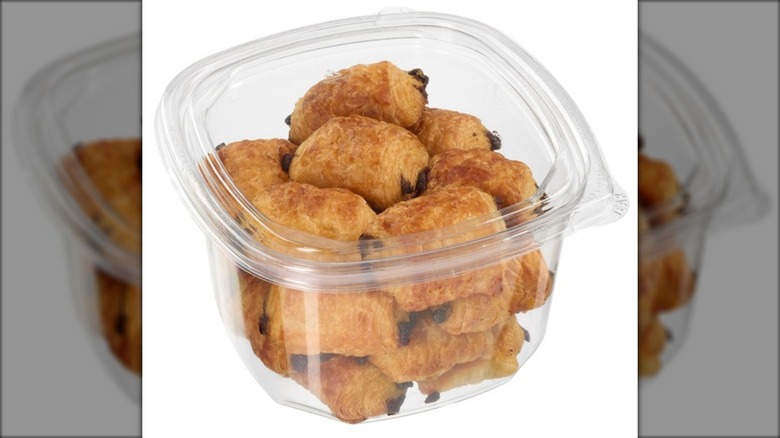 Plastic contain of mini chocolate croissants.