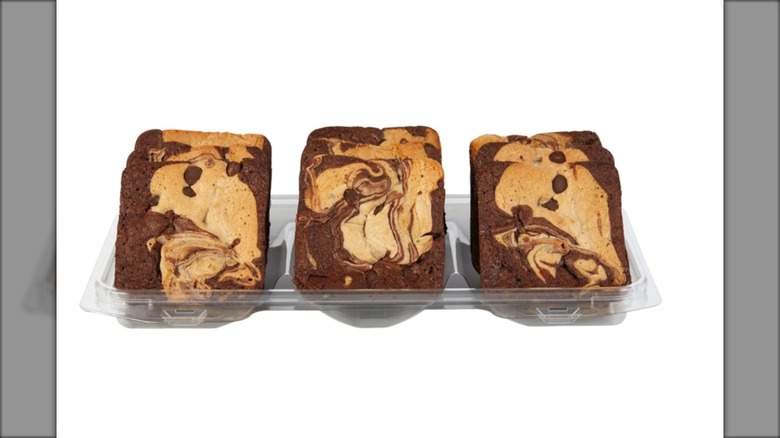 Open plastic package of cookie dough brownies