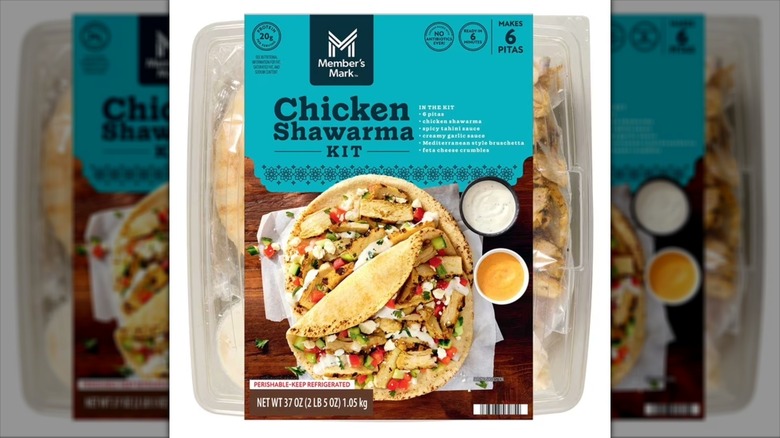 A chicken shawarma meal kit with ingredients and sauces.