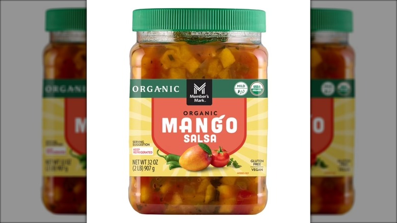Container of organic mango salsa.