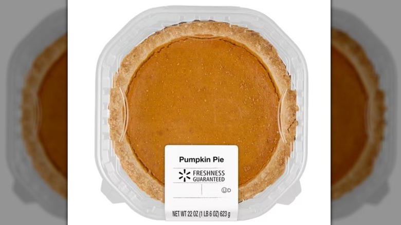 Large pumpkin pie in plastic packaging by Freshness Guaranteed.
