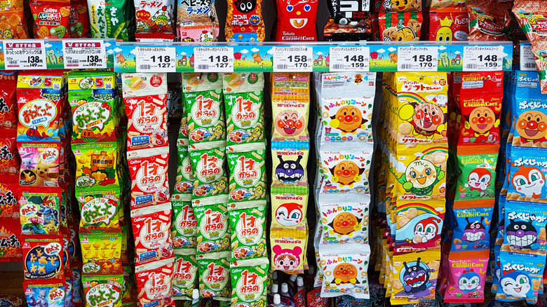 A shelf of various Japanese candies