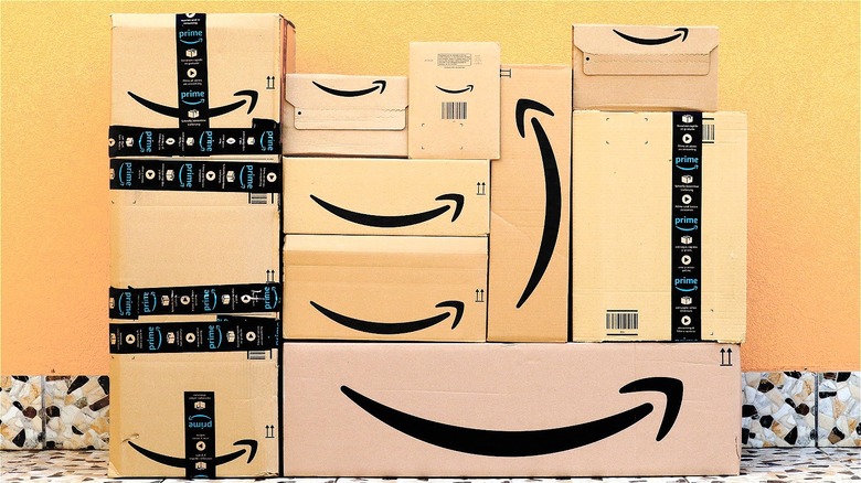 Differently sized stacked Amazon boxes