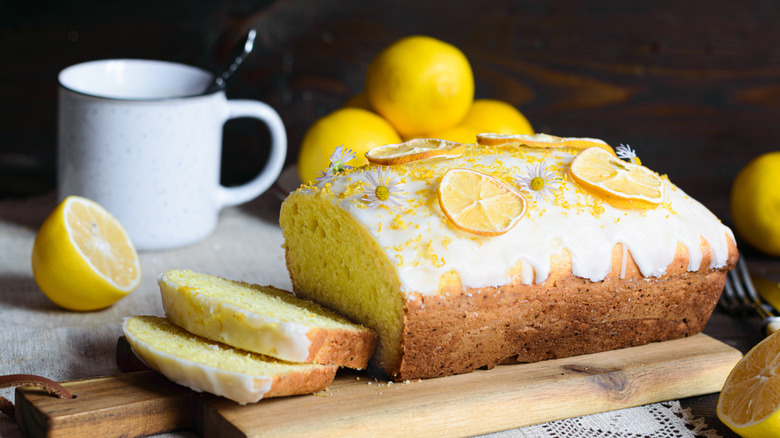 Frosted lemon bread on cutting board