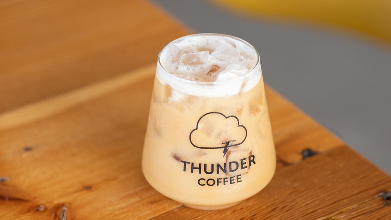 Iced coffee in a Thunder Coffee glass