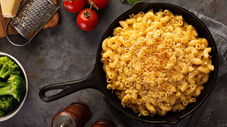 Cast iron skillet with baked mac and cheese.