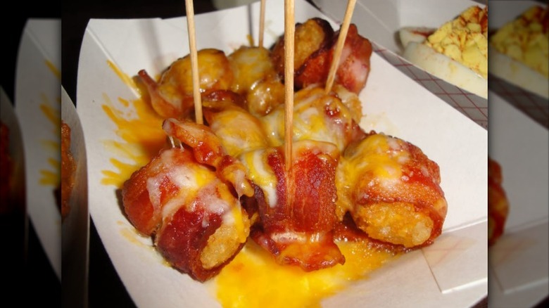 a tray of bacon-wrapped tater tots