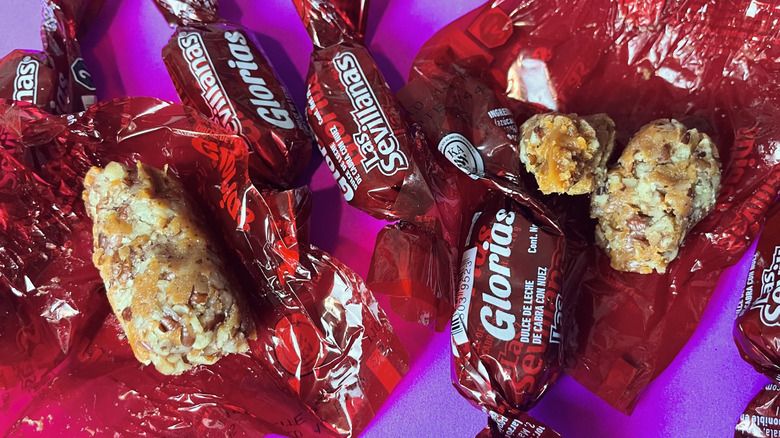 a handful of Glorias candies wrapped and unwrapped
