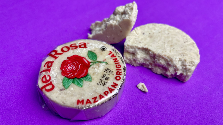 One wrapped De la Rosa mazapán candy, and one unwrapped mazapán candy
