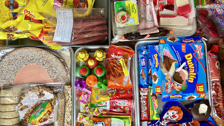 All of the candies and confections purchased to taste for this review, divided onto five different trays
