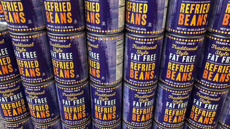 stacked cans of Fat Free Refried Beans