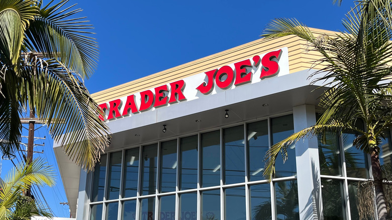 Trader Joe's exterior behind palm trees