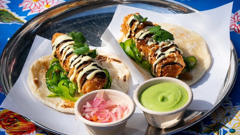 Deep fried meat on tortillas with sauces from Californios