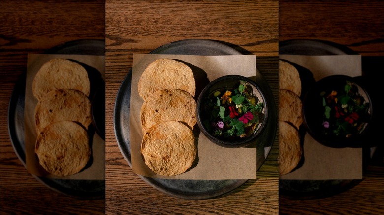 Three tortillas on a plate from Amano