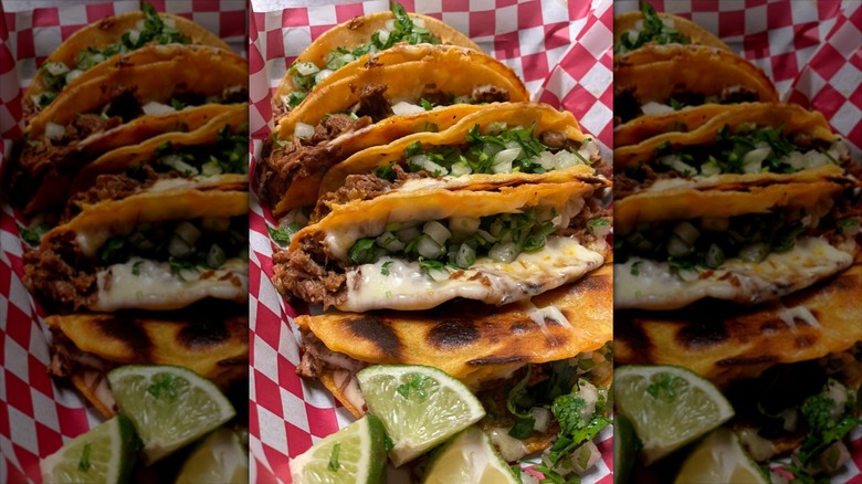 Stack of fried tacos at Tacos La Familia