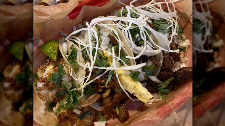 Al pastor, shrimp, brisket and carnitas tacos