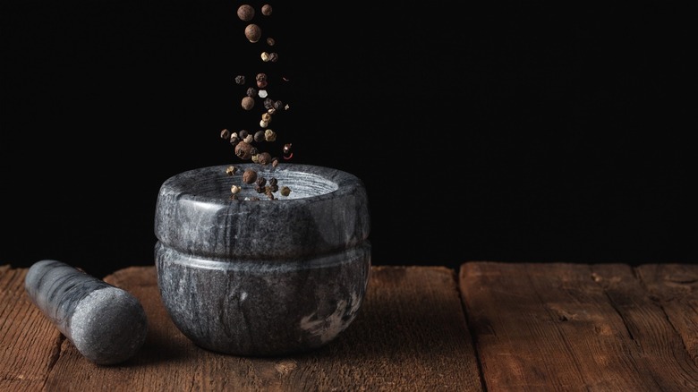 mortar and pestle on wood table