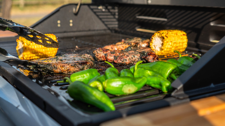 food cooking on outdoor grill