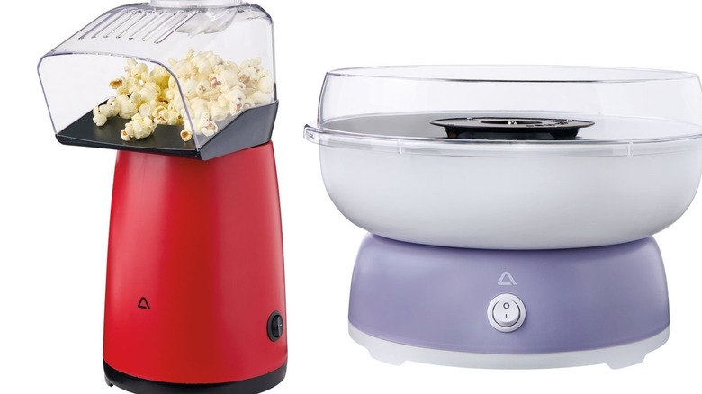 Side-by-side of red popcorn maker and thistle cotton candy machine