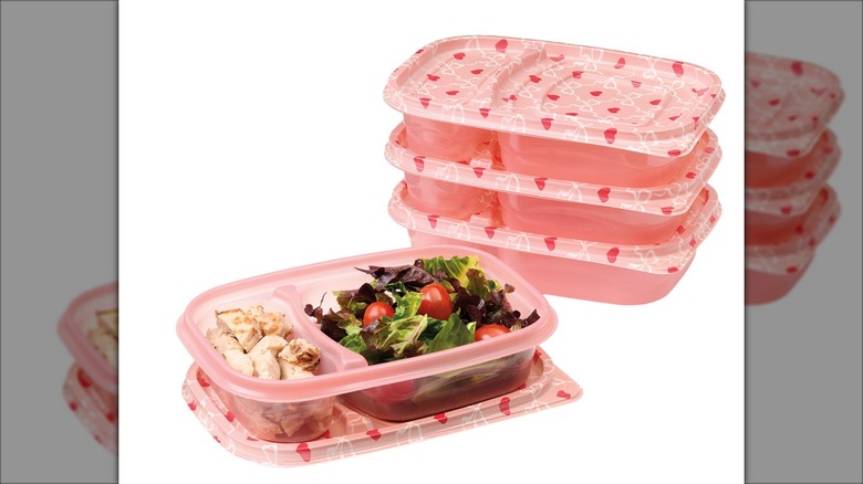 pink plastic lunch boxes with heart pattern