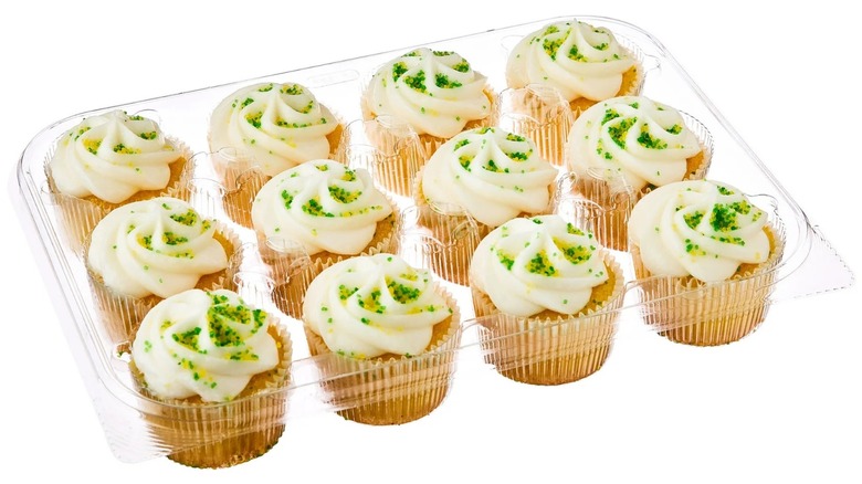 A dozen Freshness Guaranteed 7 Up cupcakes