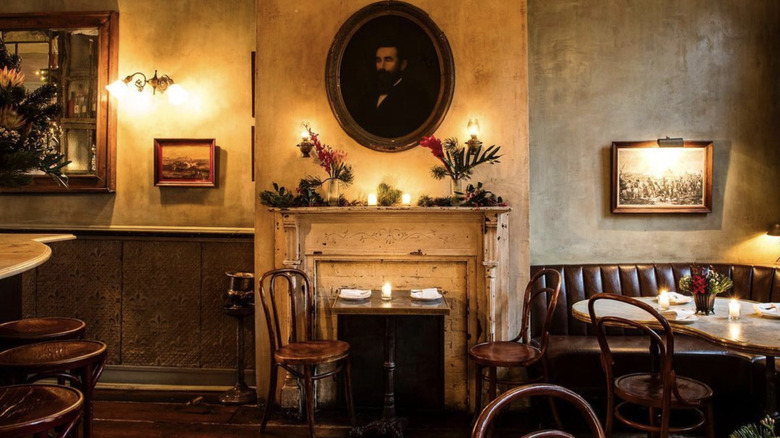 decorative fireplace and tables Maison Premiere