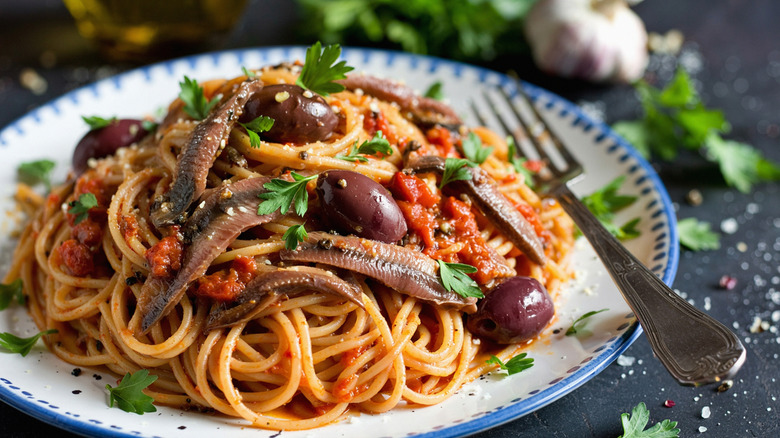 Pasta puttanesca with olives and anchovies