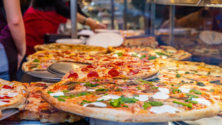 pizzas displayed in shop