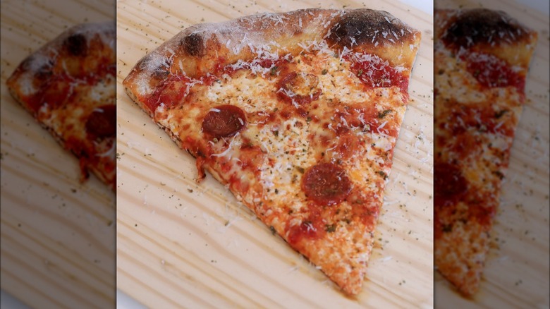 A slice of pepperoni pizza