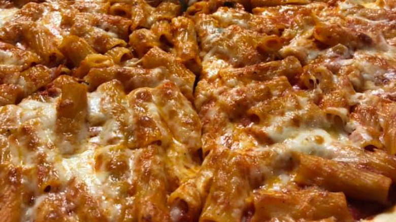 Baked ziti pasta on a pizza