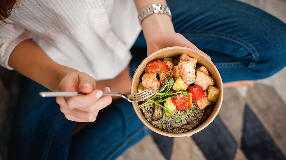 girl holding healthy food