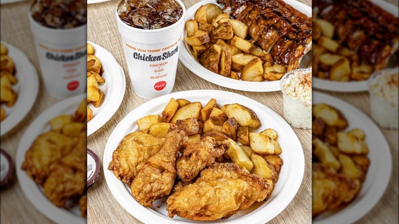 Plates of chicken, rib, potatoes