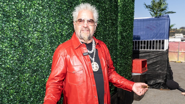 Guy Fieri with a cigar