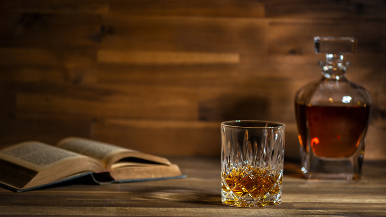 glass of rum next to decanter