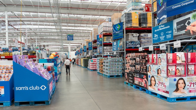 Interior of Sam's Club store with shoppers in the background