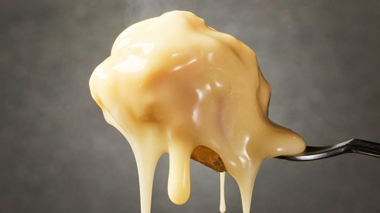 cheese sauce on fork