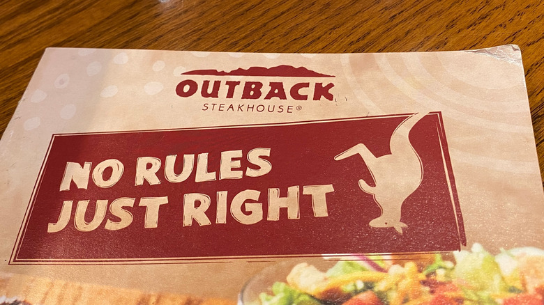 Outback menu on wooden table