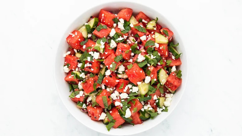 Watermelon salad in a white bowl