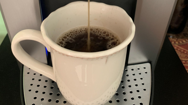 single cup of coffee brewing